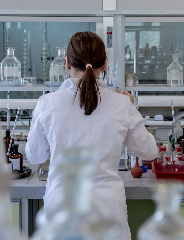 a scientist in the lab researching moringa oleifera